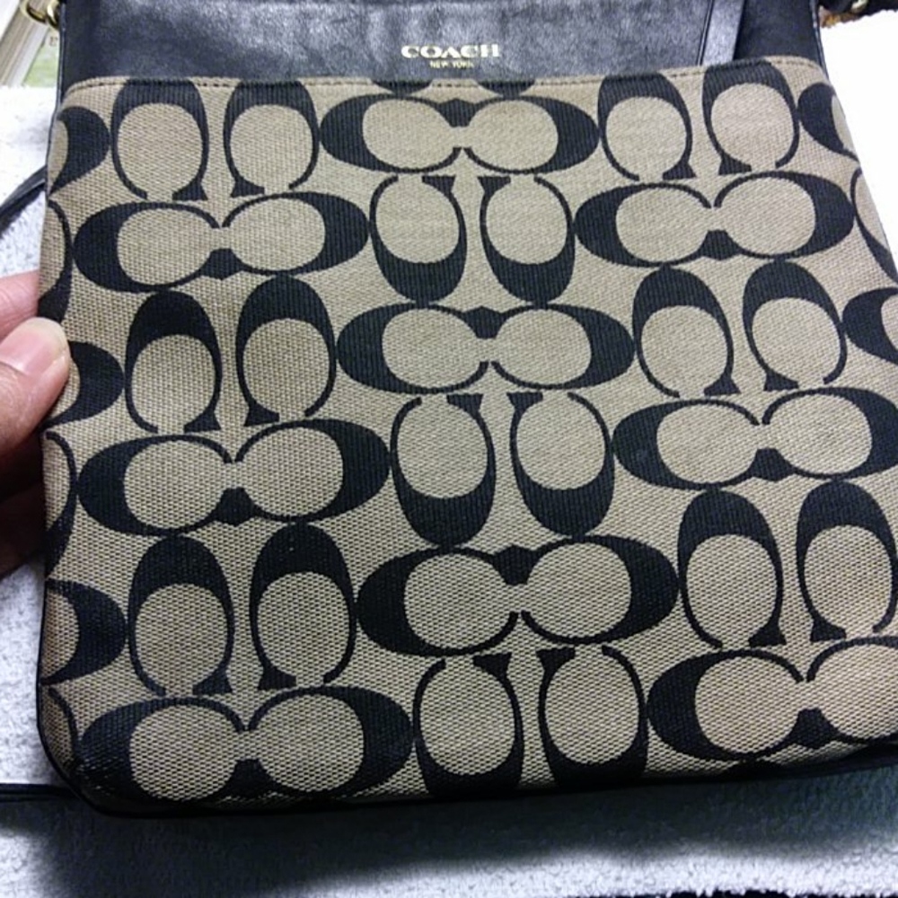 **Coach crossover purse with leather trim*